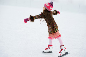 A girl ice skating.