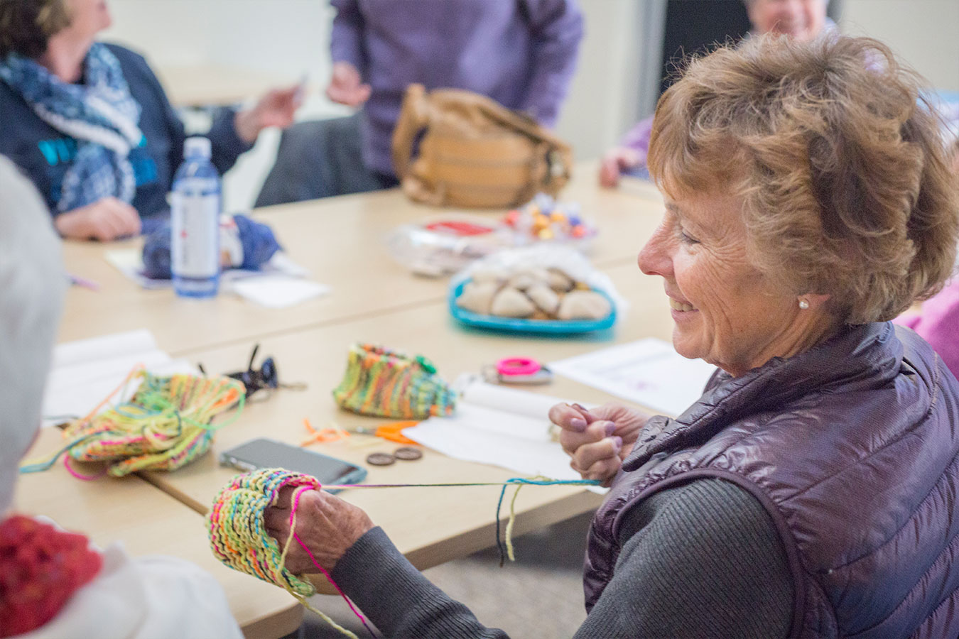 Group of adults crochets at the Bend Senior Center