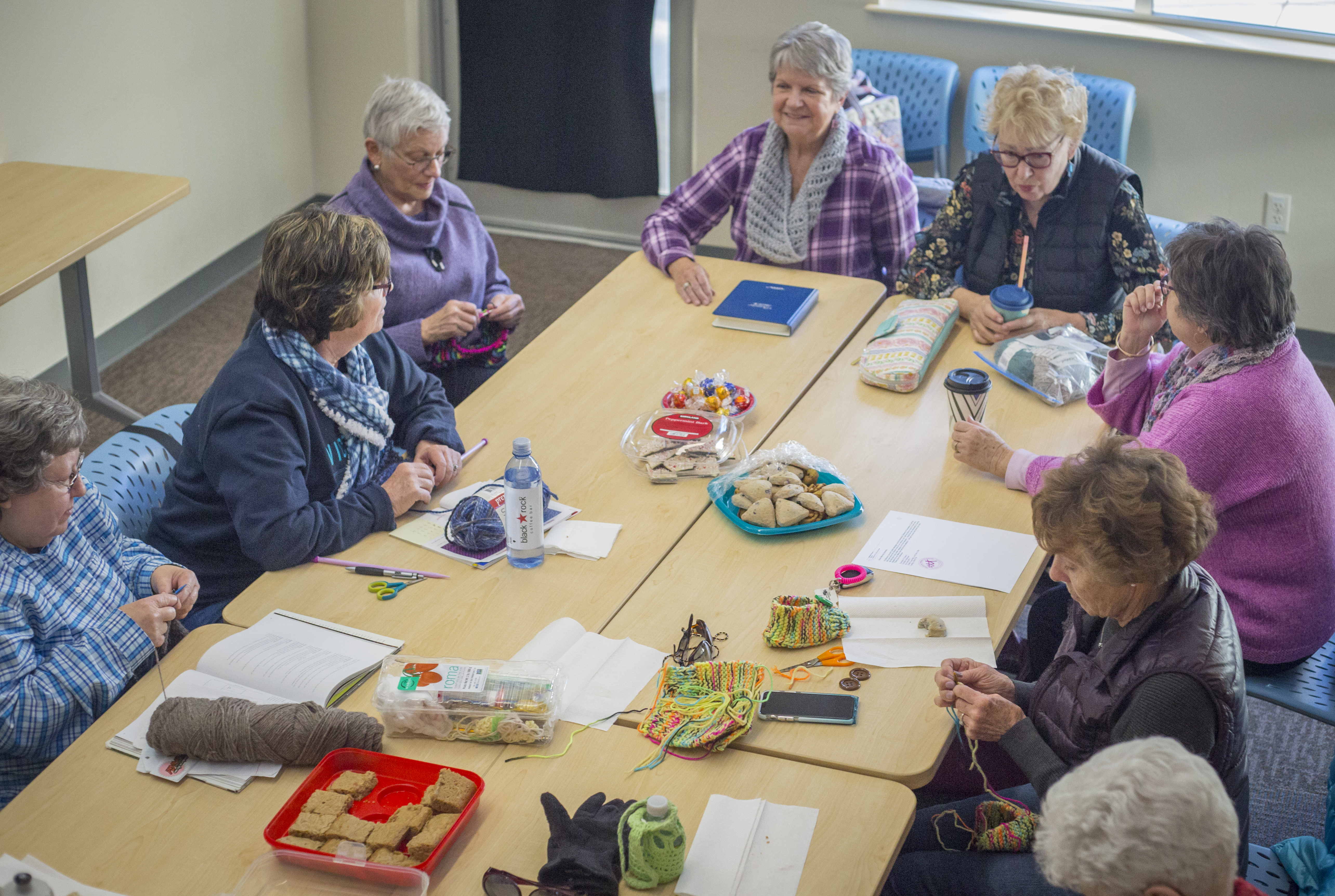 Group of adults crochets at the Bend Senior Center