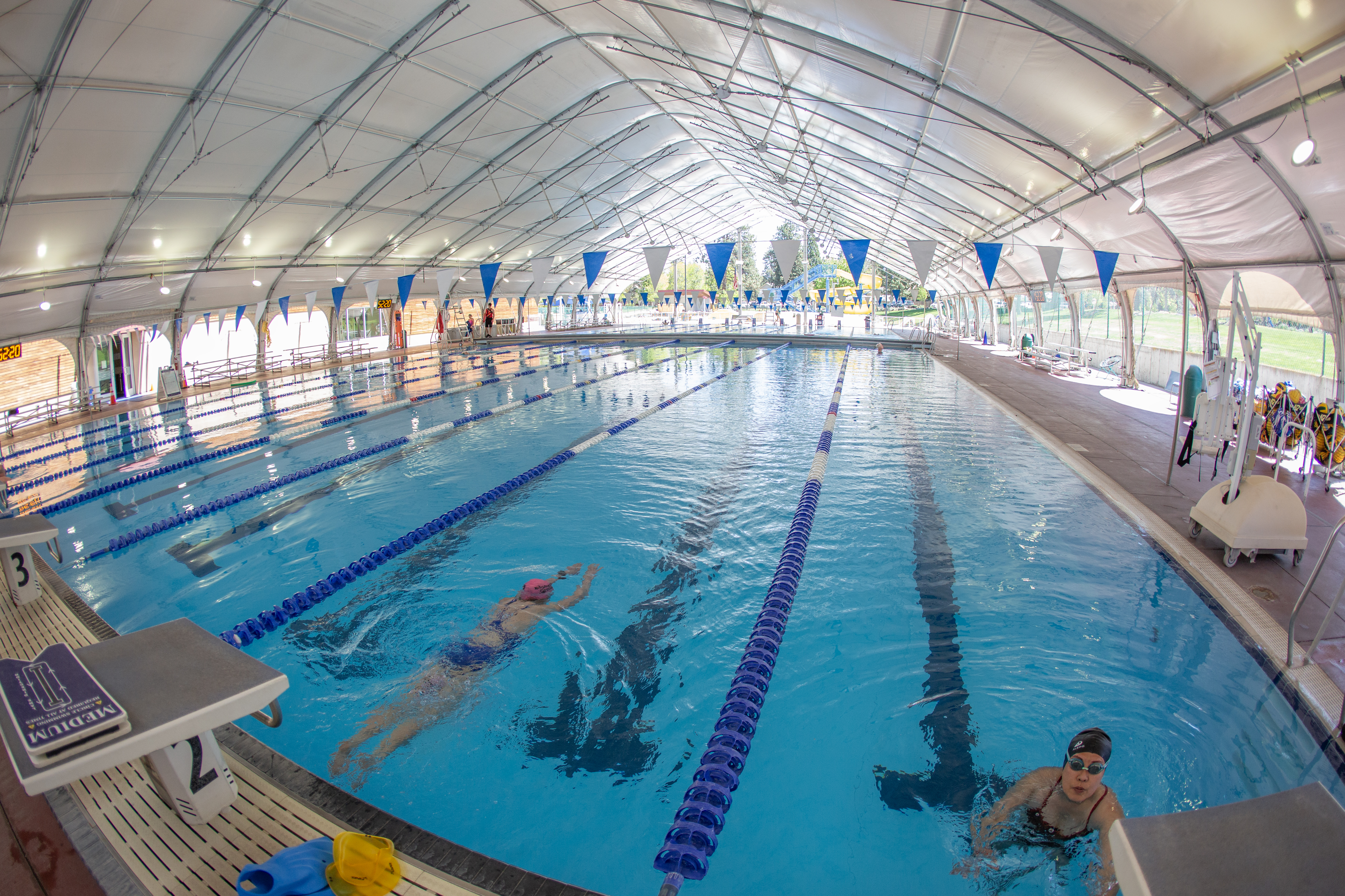 Fish eye photograph of the covered outdoor pool at Juniper