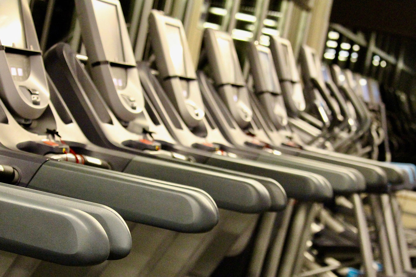 Photograph of empty running machines in the fitness center.