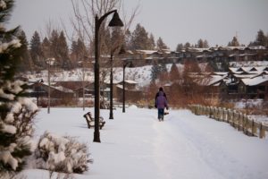 People walking in the snow at Riverbend Park