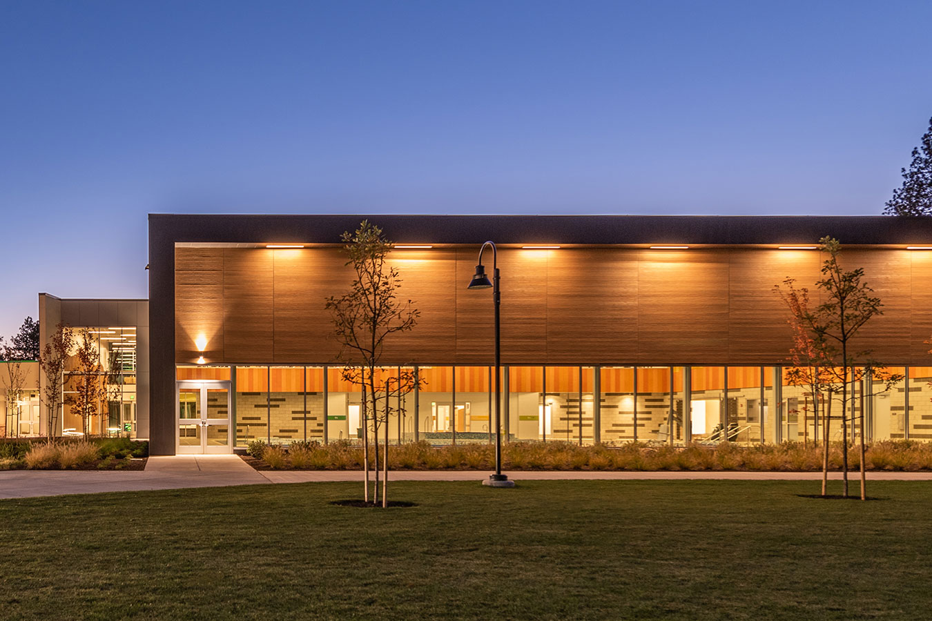 Photo of Larkspur facility at dusk.