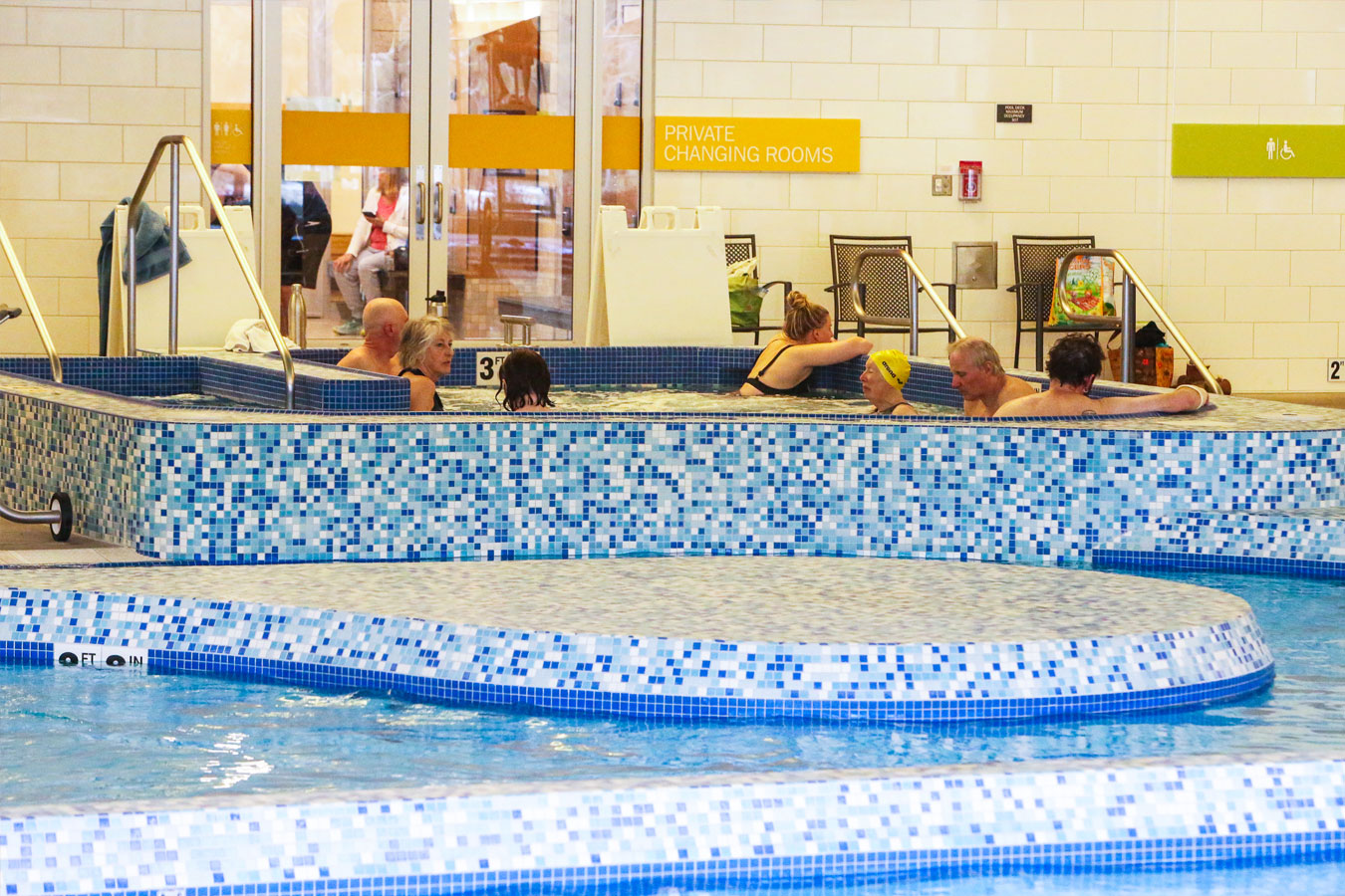 Several patrons enjoying the hot tub at Larkspur.