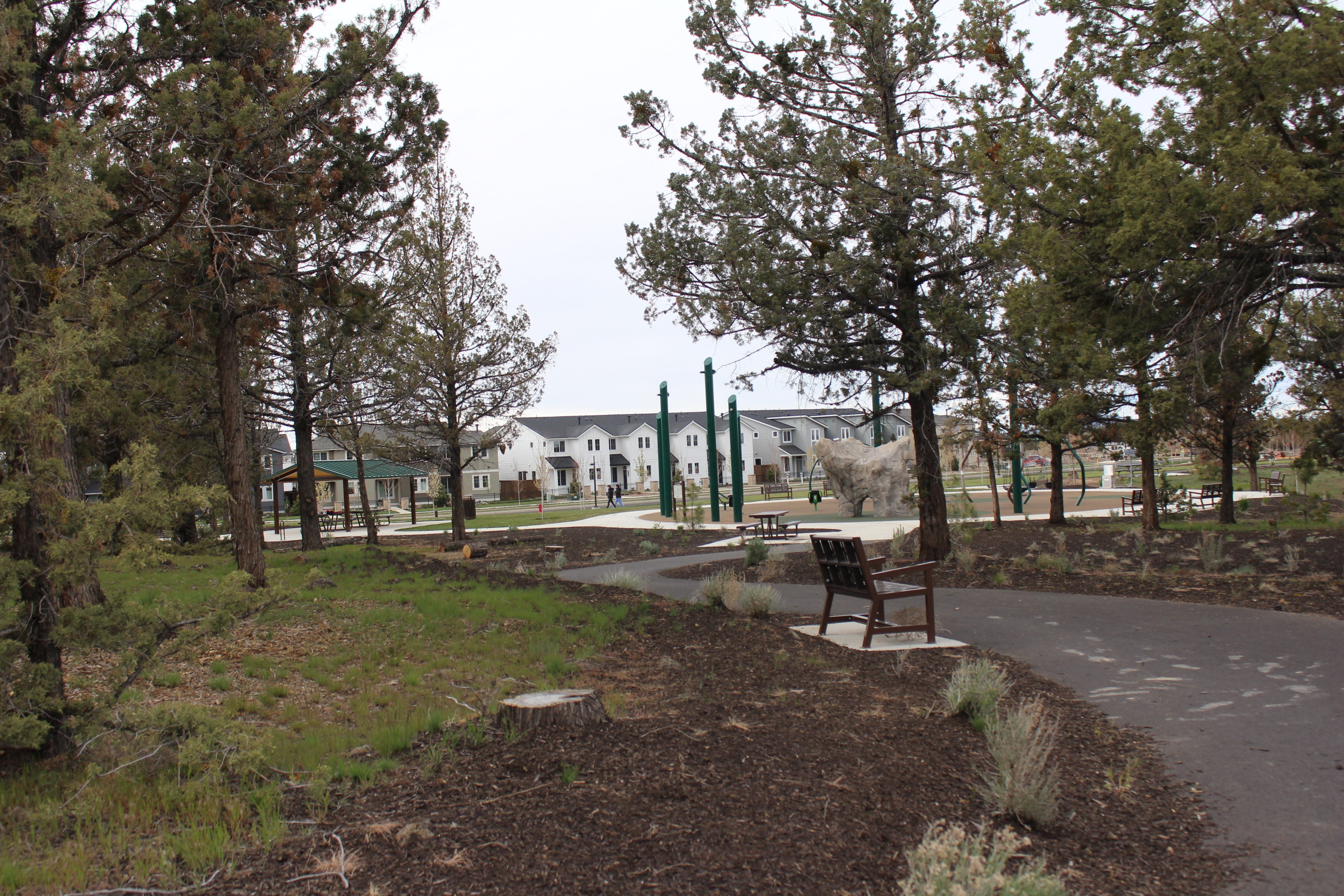 A pathway and bench at Fieldstone Park