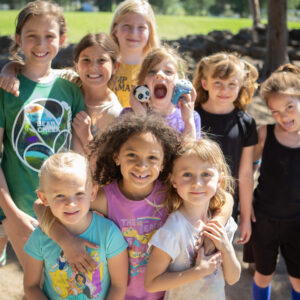 Large group of children smiling at the camera at Kids Inc.