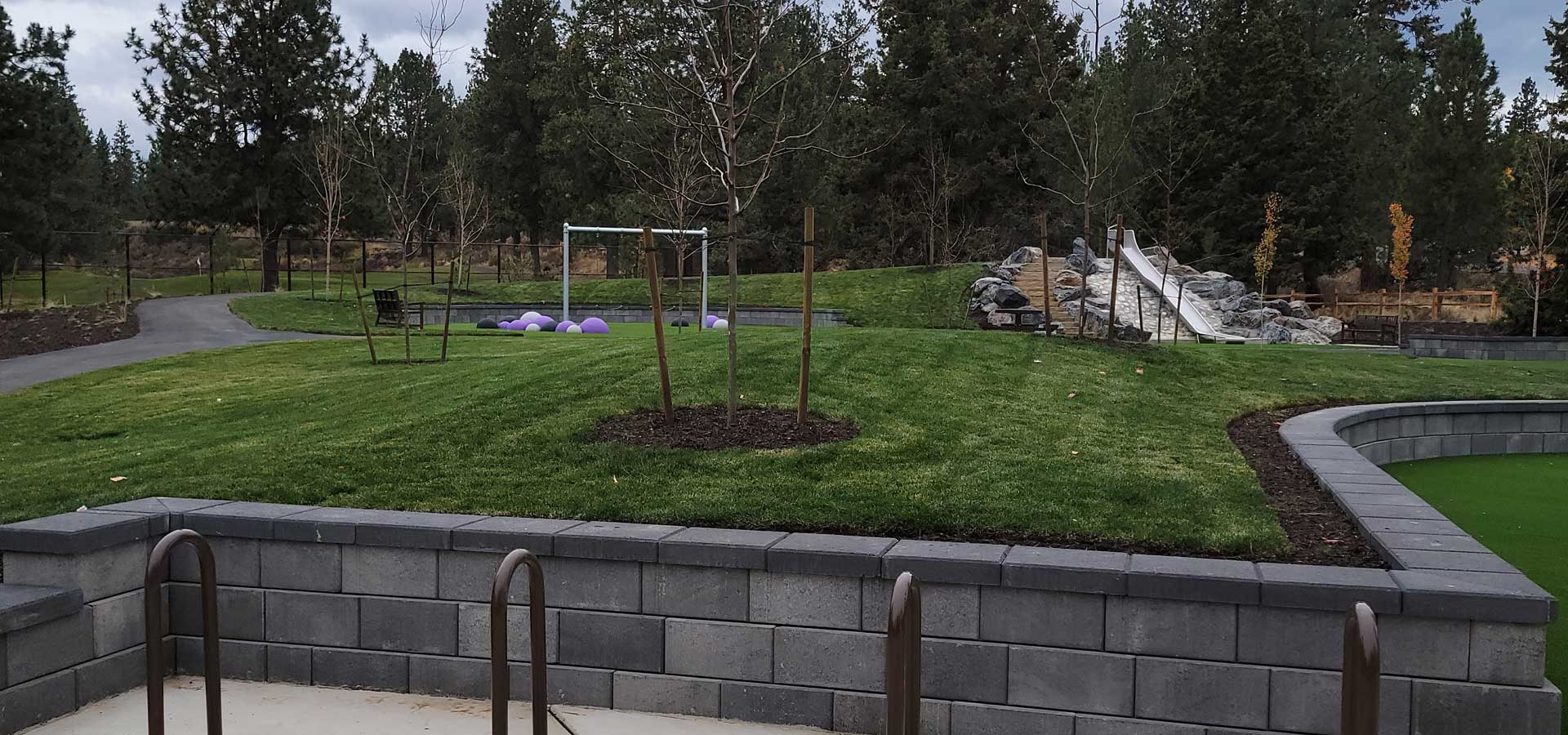 Photograph overlooking the bike racks and grassy area at Little Fawn Park.